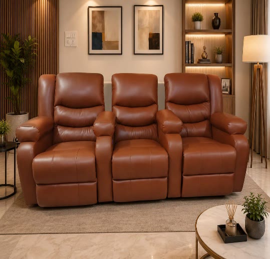 Tan leather three-seater recliner sofa